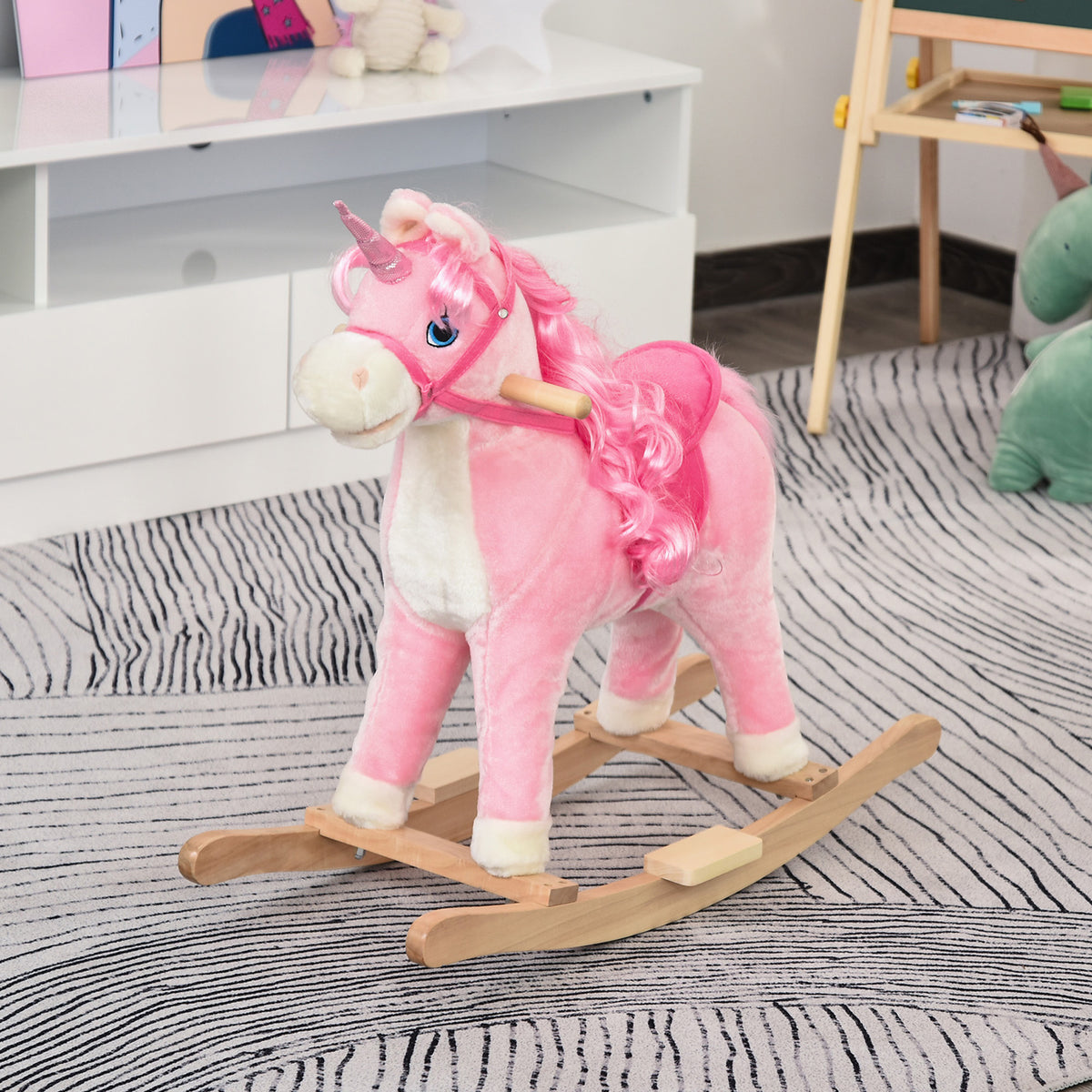 Cavalo de balanço para bebê acima de 36 meses com forma de unicórnio Agradável com sons engraçados de música Almofada macia Apoio para os pés 74x33x62 cm Rosa — foto 2