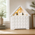 Calendário de Advento de Natal Madeira com 24 Gavetas e Luzes LED Decoração de Natal Modelo Casinha 39x9x42cm Branco — Ambiente | Lifestyle