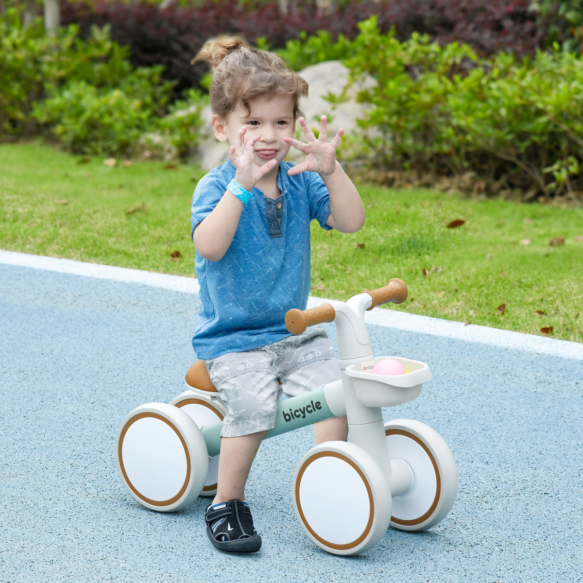 Bicicleta sem Pedais para Crianças de 12-36 Meses Bicicleta de Equilíbrio com Assento Ajustável Cesta e 4 Rodas Silenciosas Carga 20 kg 56x27x39 cm Verde — foto 2