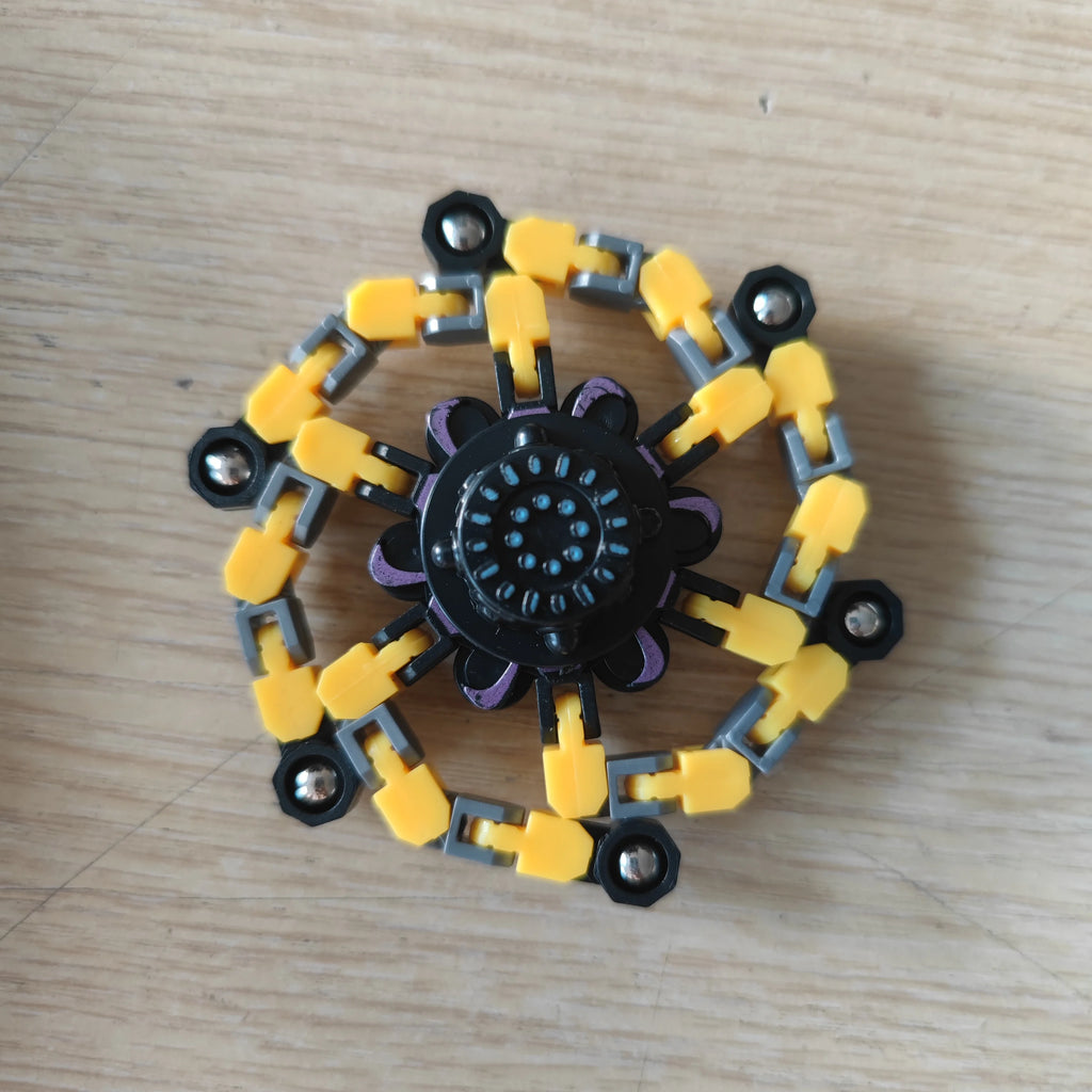 Brinquedo anti-stress fidget spinner em corrente deformável, amarelo — foto 2