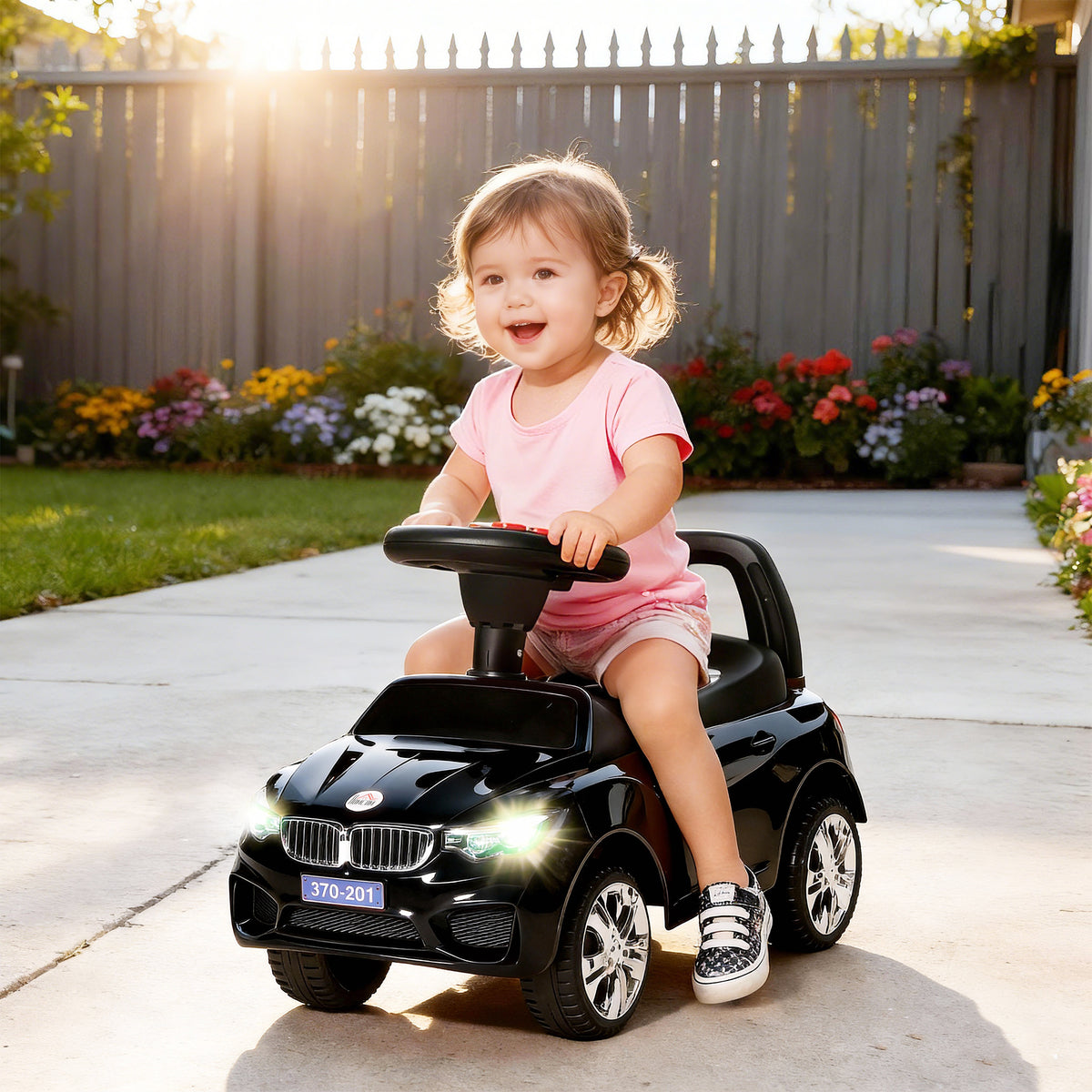 Carro Andador para Crianças de 18-36 Meses com Faróis Música Buzina Volante Compartimento de Armazenamento e Alça para Empurrar 63,5x28x36 cm Preto — foto 2