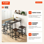 Bar Table Set with 4 Stools and Footrest 5 Pieces Table 100x60x88cm Stools 32x32x57cm Black and Walnut — Infografia EN (em utilização)